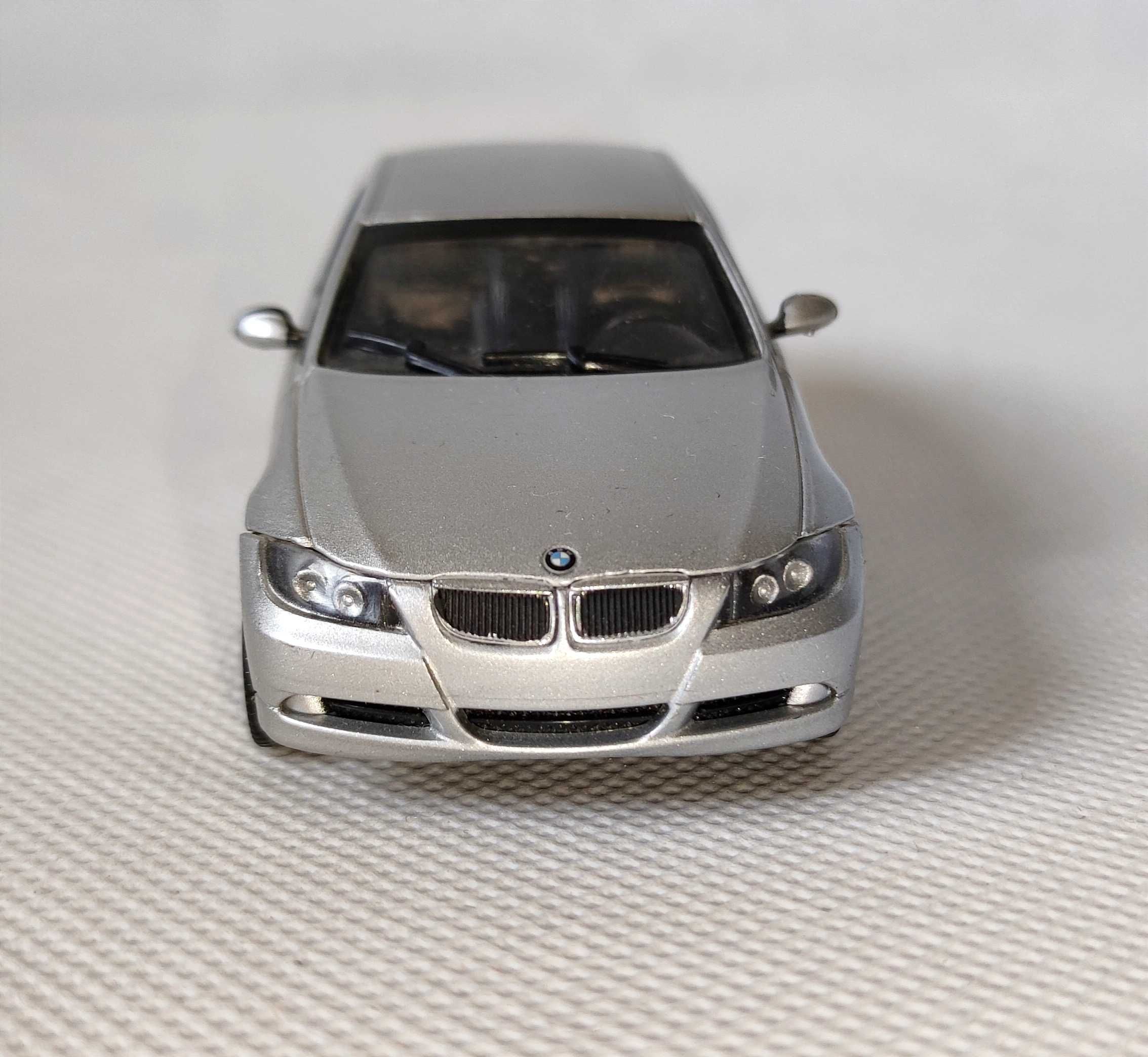 Модель BMW E90 330i Welly 1:43