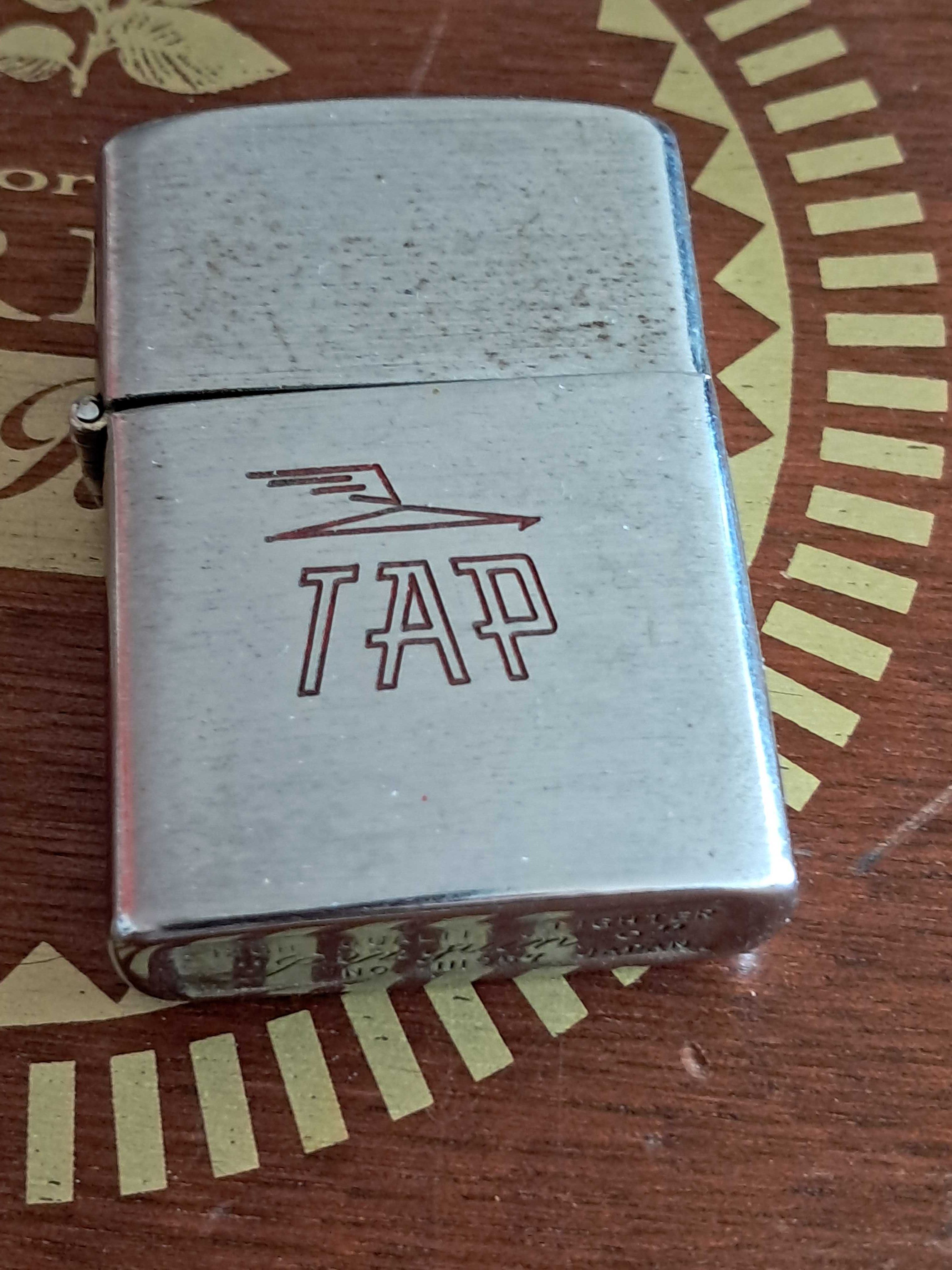 isqueiro penguin tap