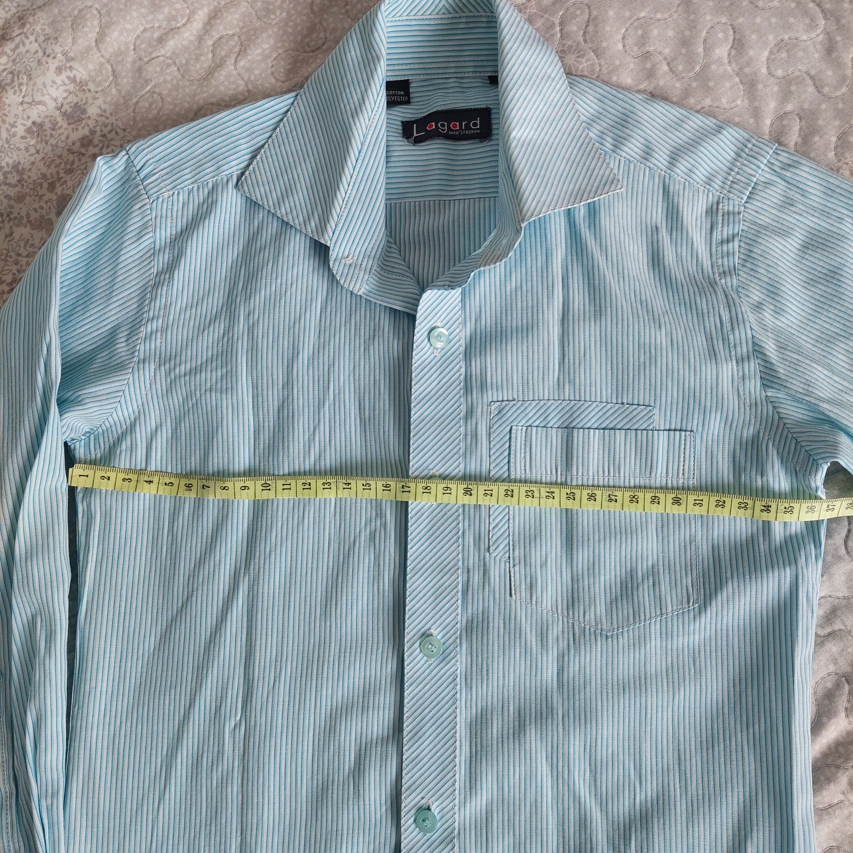 Класична сорочка на хлопця в школу біла у блакитну смужку