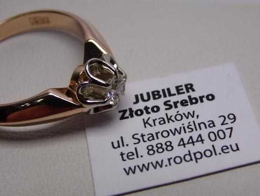 Pierścionek z brylantem 0,24 ct. Różowo białe złoto R.16