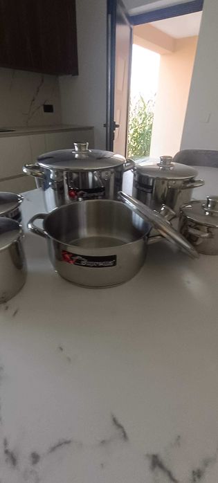 Panelas marca suprema em  inox