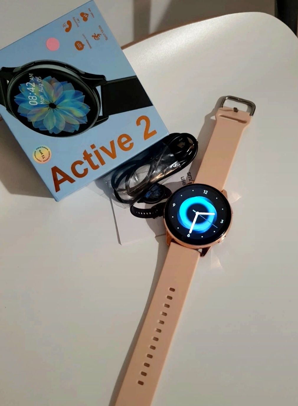 Smartwatch złoty na pasku