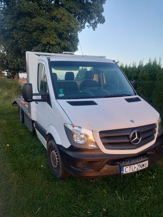 Pomoc drogowa holowanie Transport Auto laweta