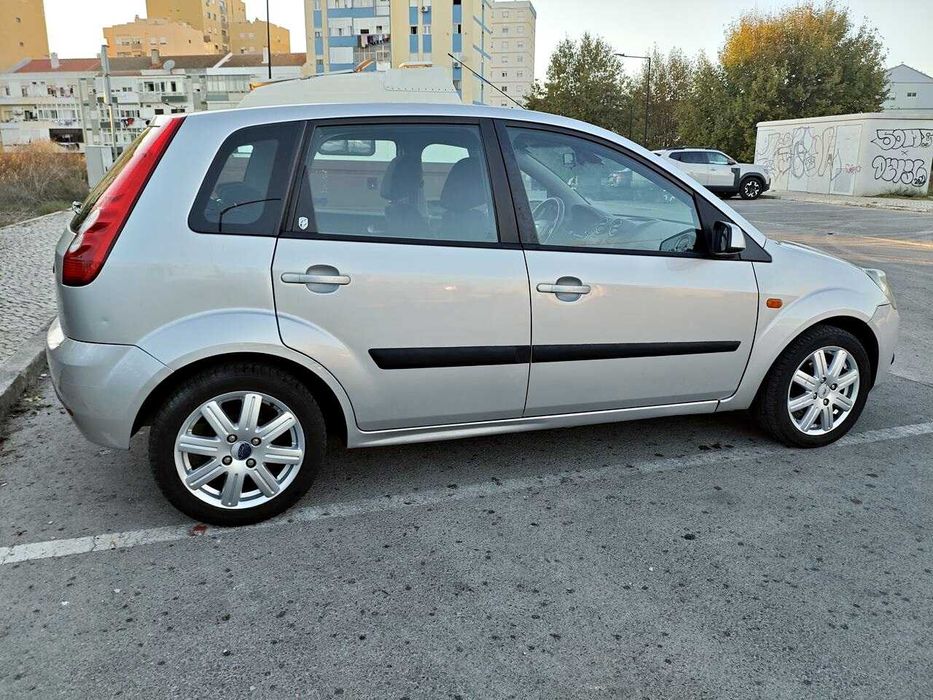 Ford Fiesta 1.2- A/C-  versão Guia