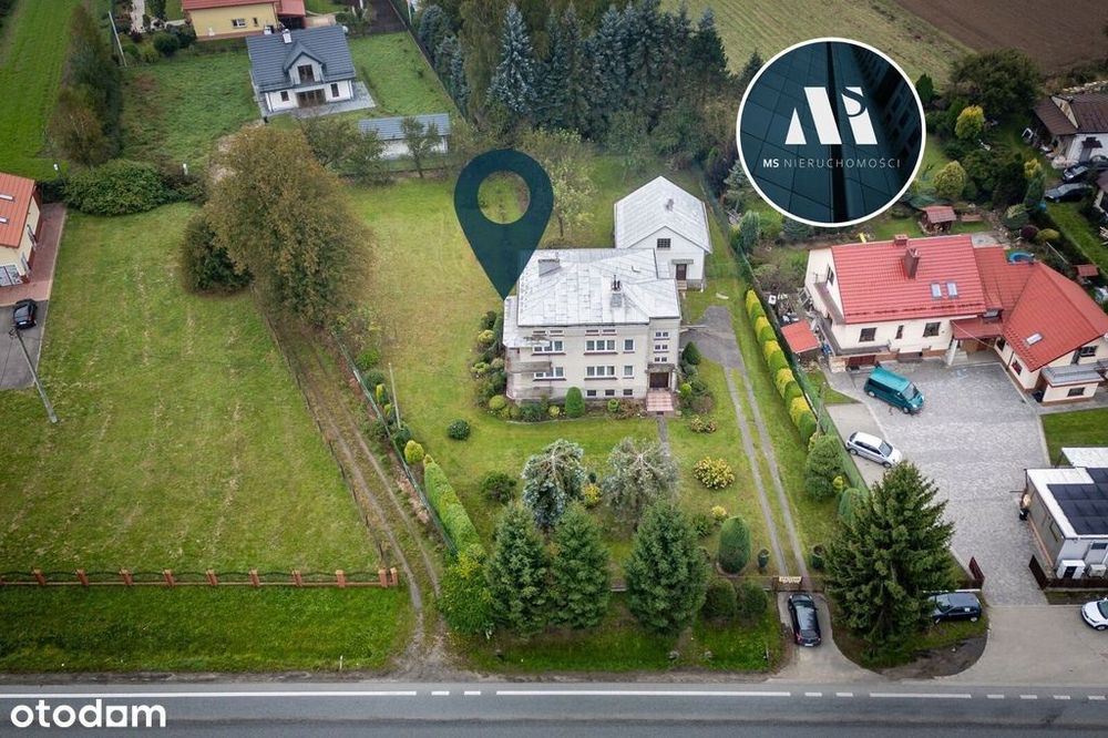 Dom w Krośnie z 2 mieszkaniami i dużą działką!