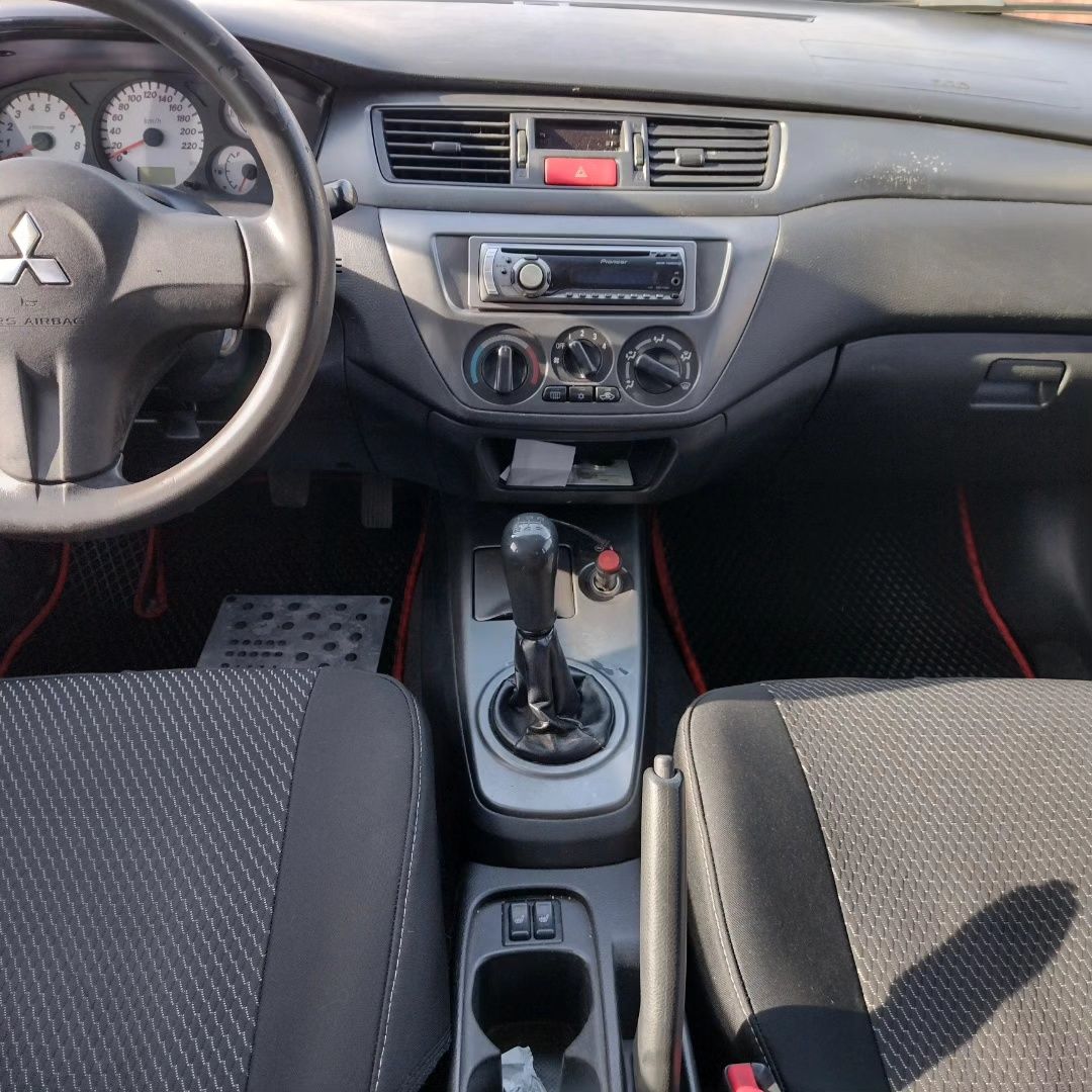 Mitsubishi lancer 1,6 газ кондиціонер підігріви