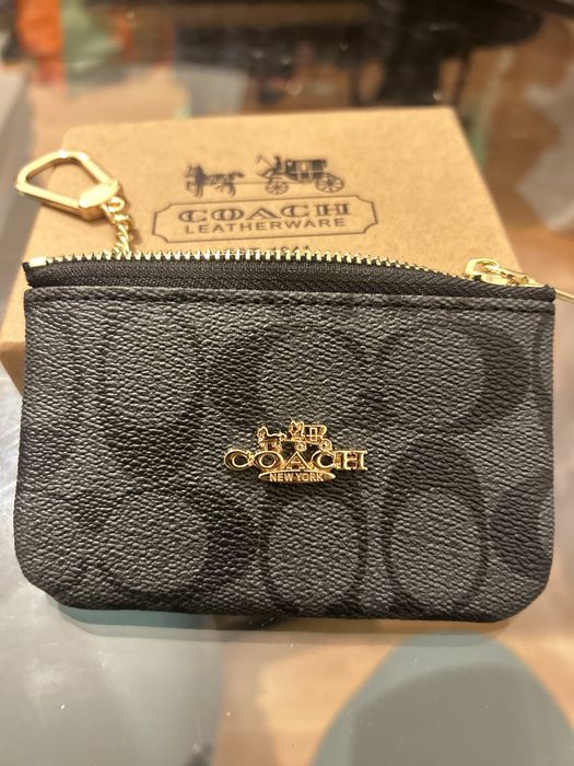 Porta moedas Coach