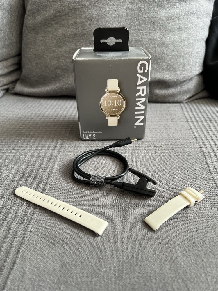 Pudelko garmin lily 2 wraz z oryginalnym paskiem i ładowarką