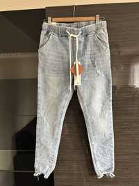 Nowe jeansy stylowe na gumce rozmiar S/36