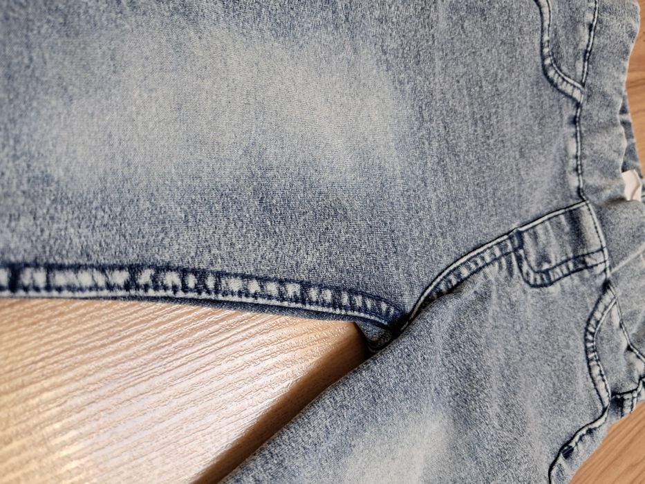 Spodnie jegginsy H&M 62 dla dziewczynki. Fajny efekt przetarcia. Mięci