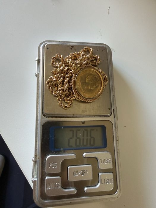 Fios de ouro 19,2k com medalhas de libra