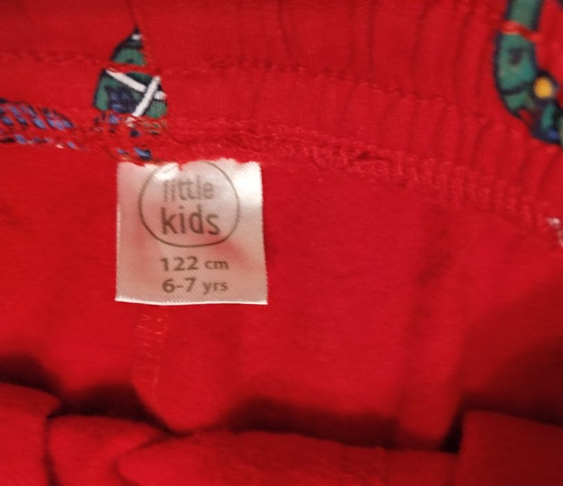 Spodnie chłopięce z dinozaurami motyw świąteczny