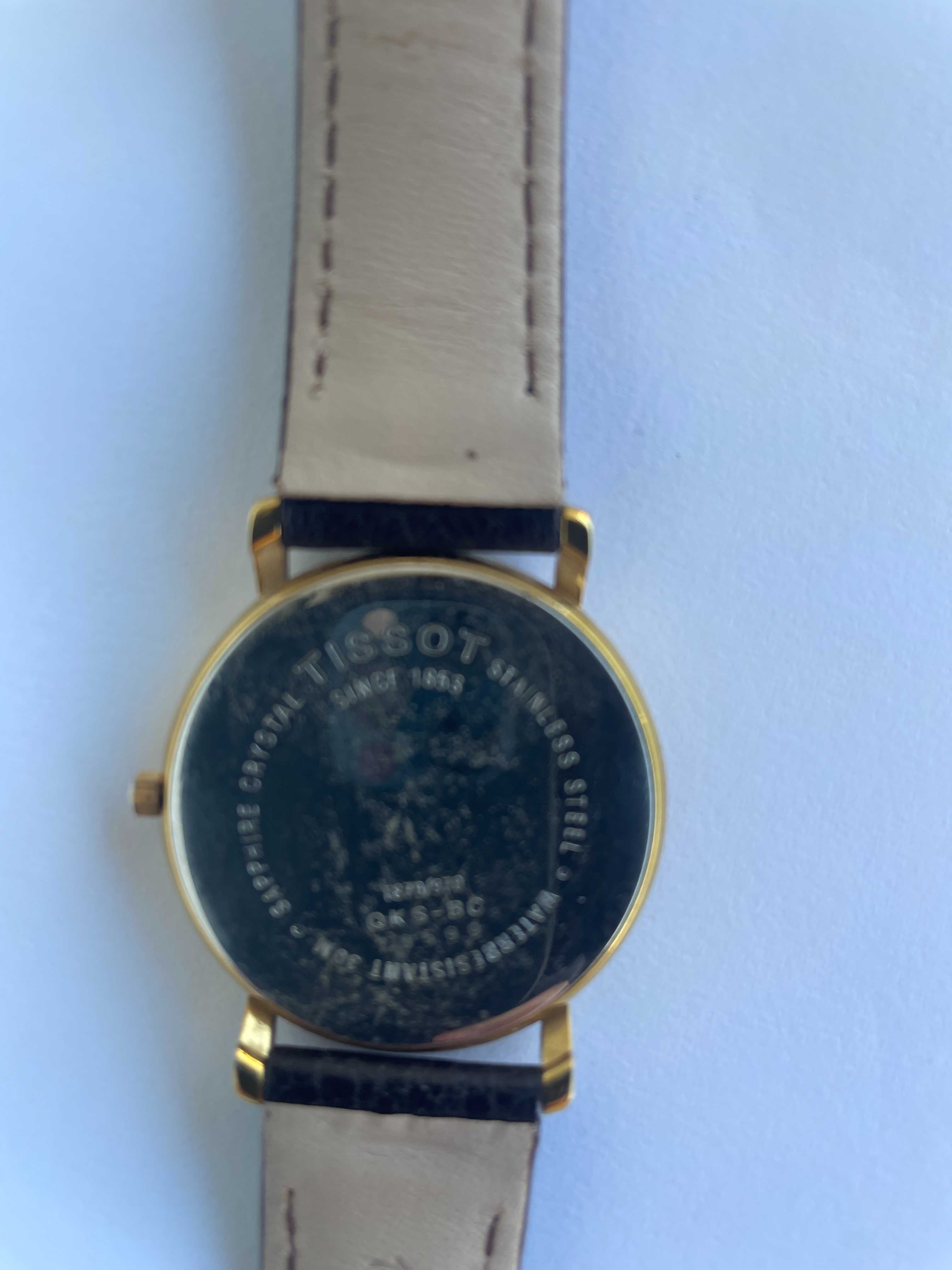 Relógio  Tissot clássico, números romanos