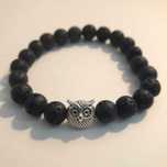Pulseiras de pedras semipreciosas com coruja e tigre