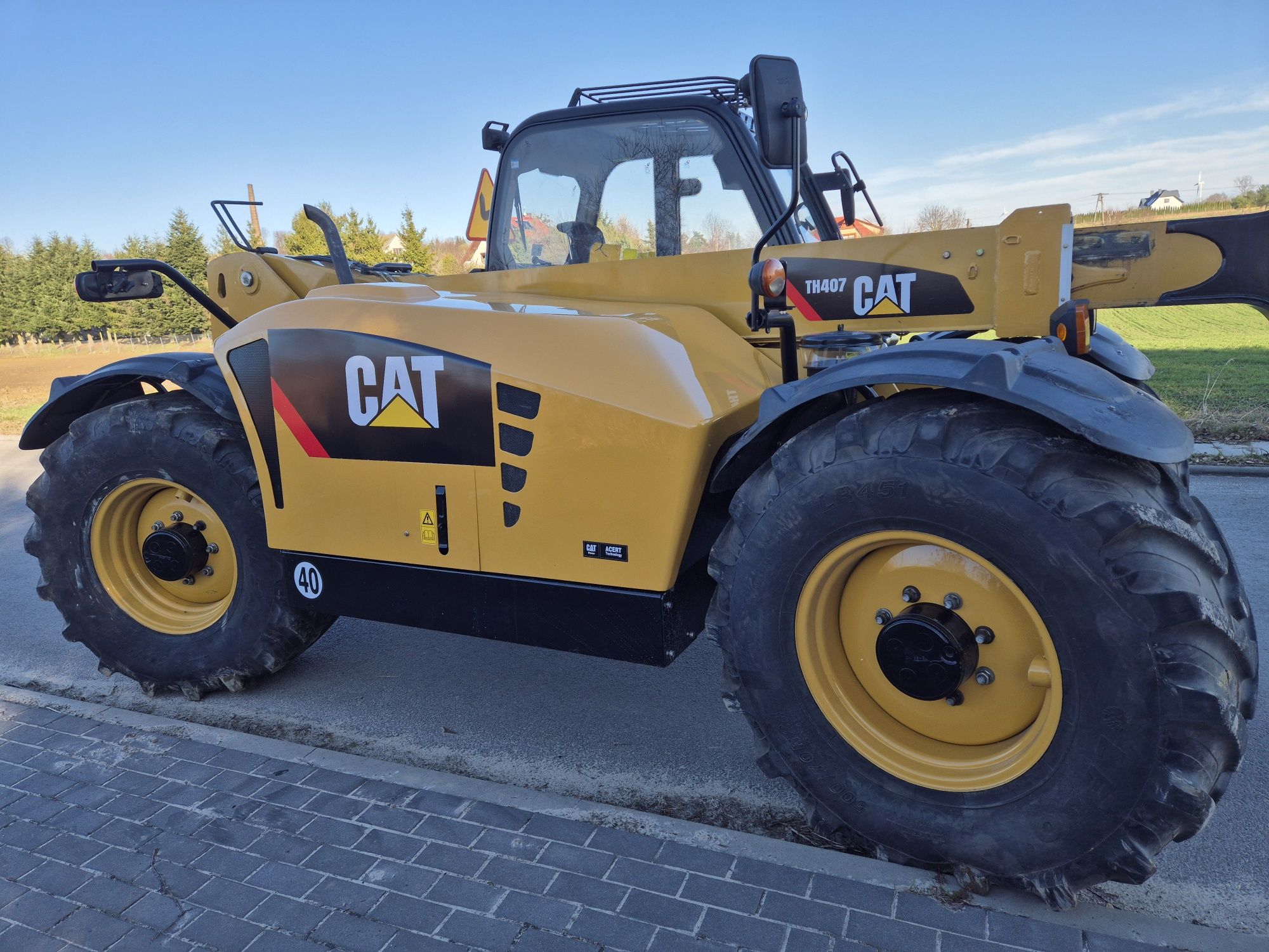 Ładowarka  Teleskopowa Caterpillar  CAT TH407 09rok 4 tony 7 m 40 km/h