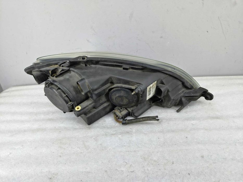 Lampa Reflektor Lewy VW Golf V PLUS