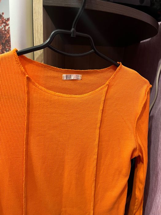 Кофта помаранчева в рубчик