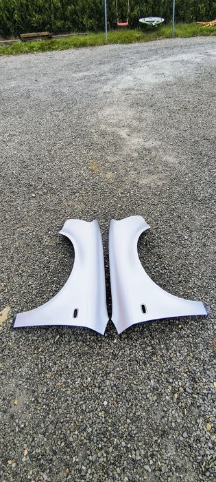 Błotnik nowy audi a4 b7 lewy prawy Srebrny LY7W OCYNK + KONSERWACJA