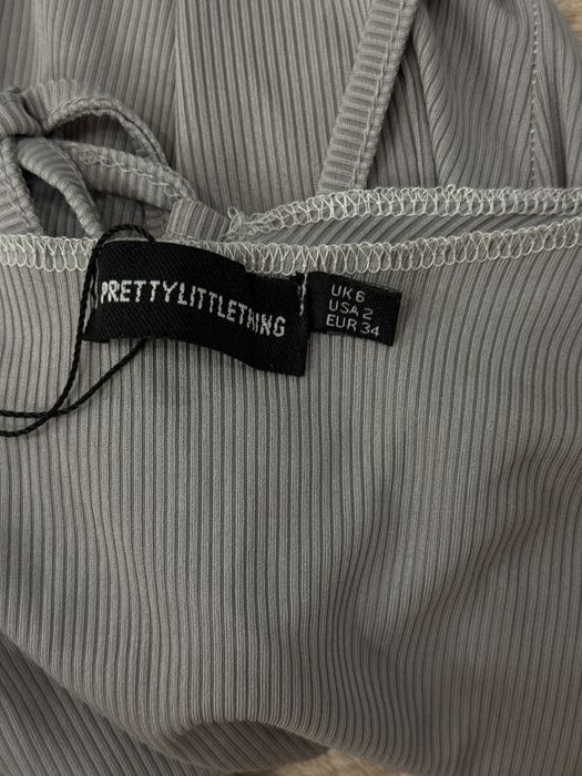 Сіра сукня шви навиворіт