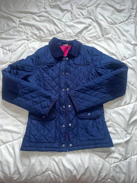 Стьобана куртка на дівчину.