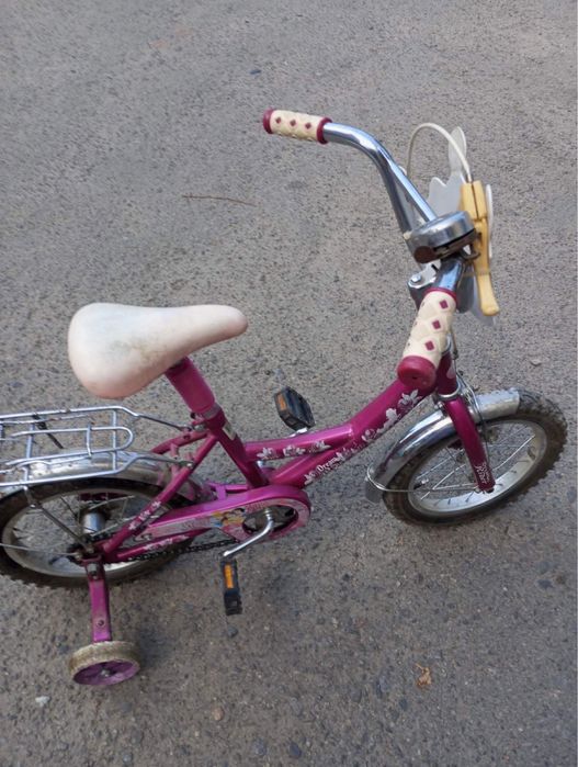 Дитячий рожевий велосипед
