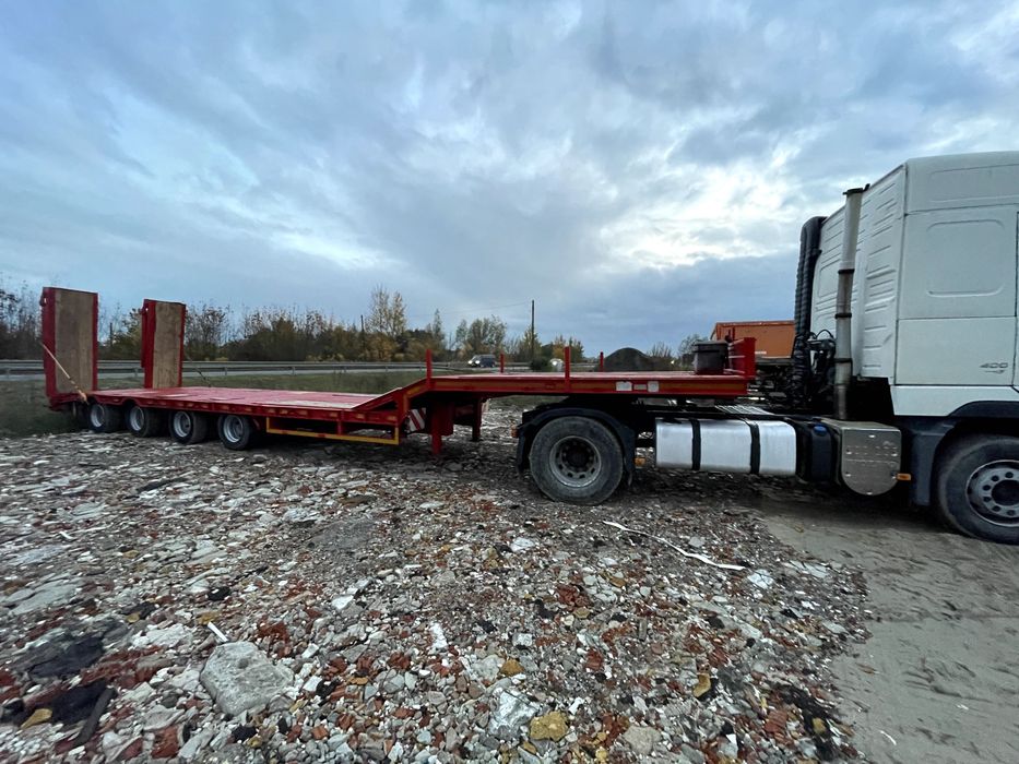 Naczepa Niskopodwoziowa 4 osie dwie skrętne poszerzane