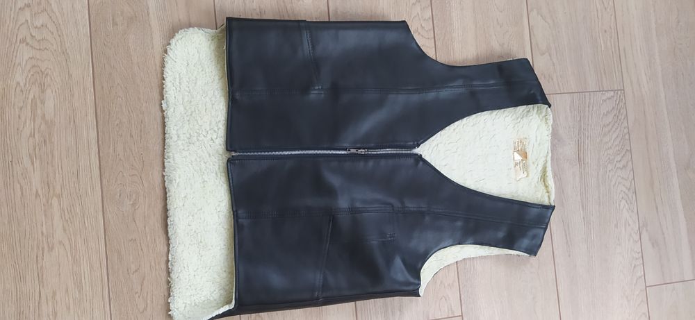 Тепла зимова жилетка