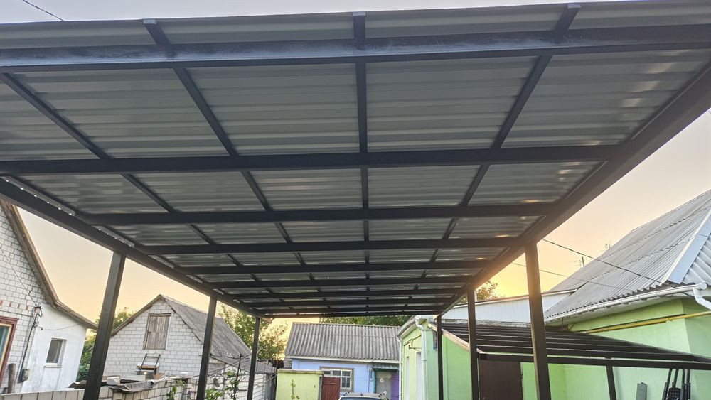 Навесы для автомобиля,ворота,заборы из профнастила.