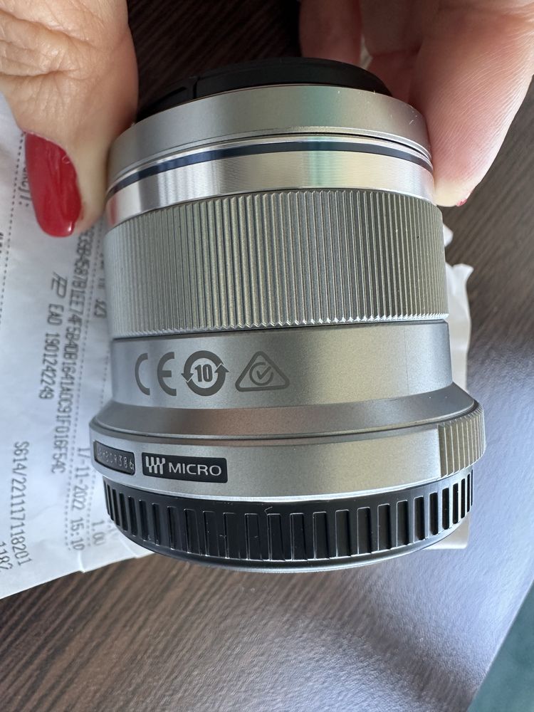 Nowy obiektyw  Olympus, 45mm srebrny, paragon