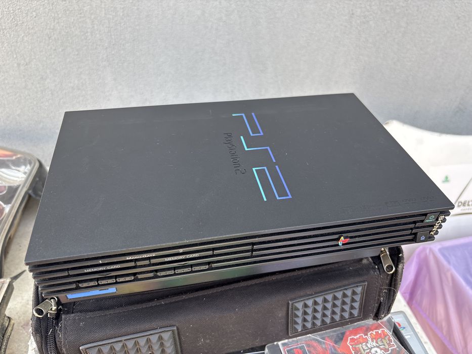 vendo playstation 2 c jogos