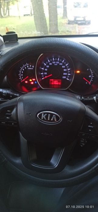 Kia rio 3 2012 год