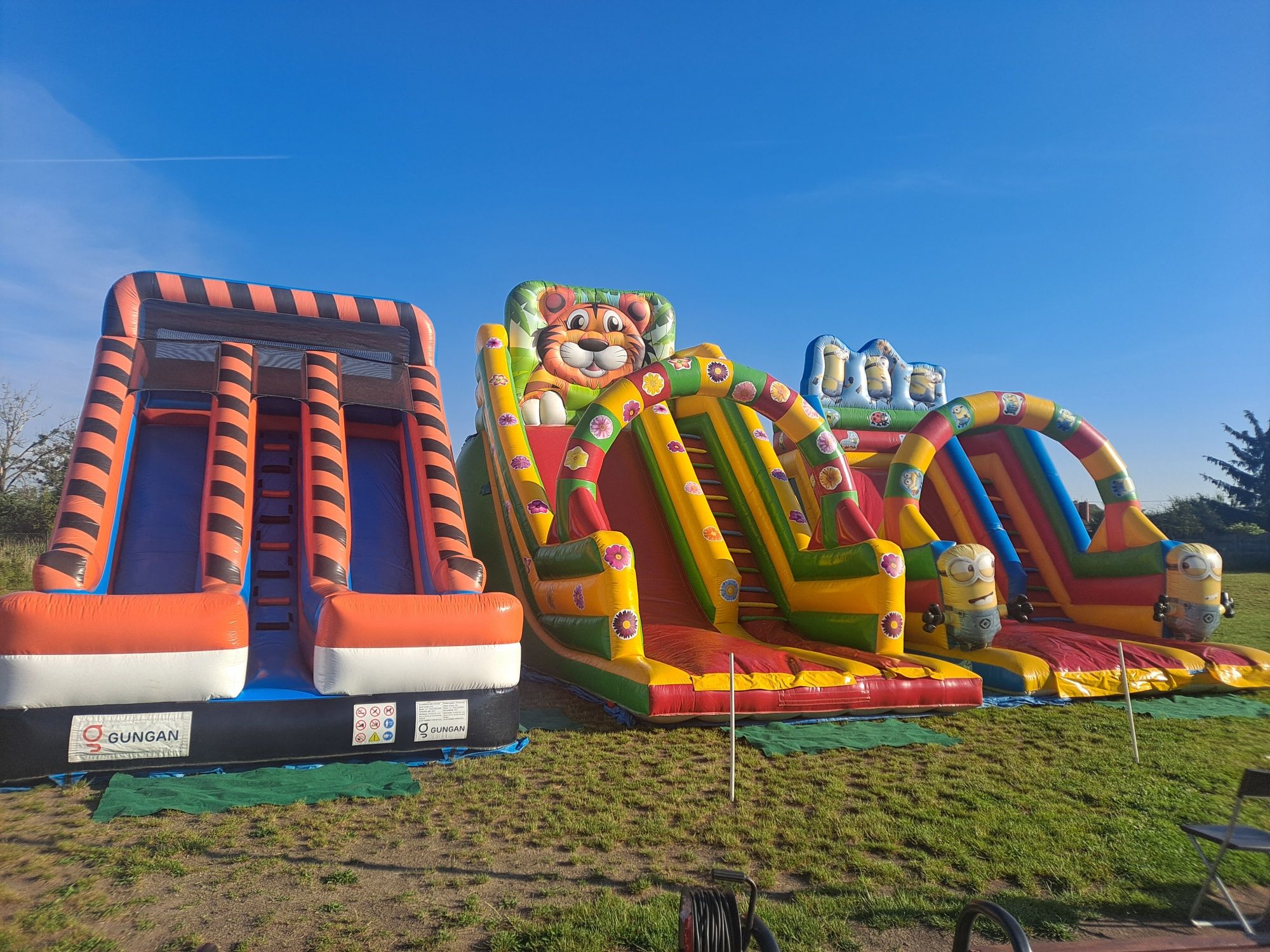 Zjeżdżalnie zamki dmuchane WYNAJEM wata balony animacje tatuaże