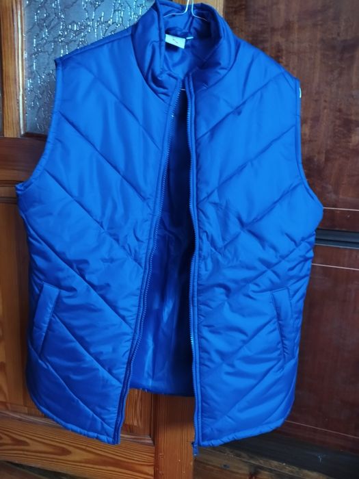 Жилетка нова                 .