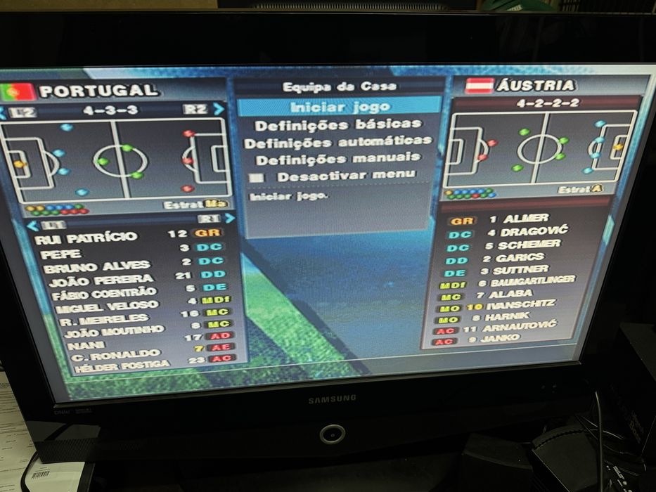 Playstation 2 com 2 comandos e 1 jogo