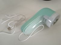 Aparelho de limpeza de pêlos de gato e coton