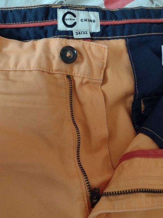 jasno pomarańczowe spodnie Cubus typu chinos - rozmiar W34 L32