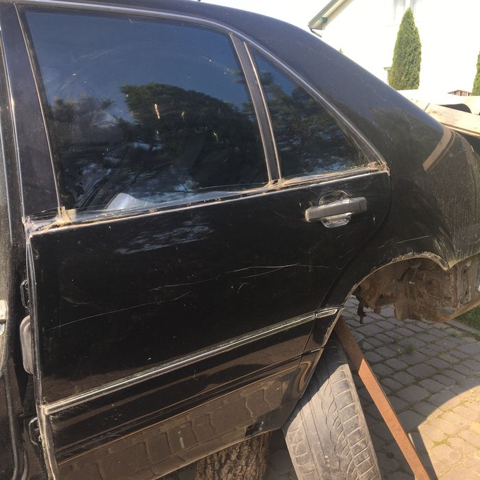 Двері задні ліві mercedes w140