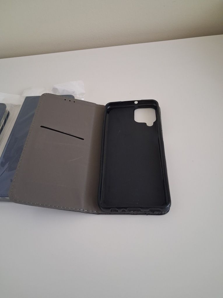 Etui do telefonu ssung A22/M22 nowe z klapka czarne i granatowe