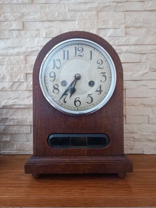 Kominkowy zegar Baba