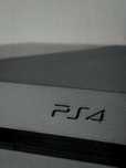 Konsola PlayStation 4 FAT - (w zestawie gratis jedna gra - do wyboru)