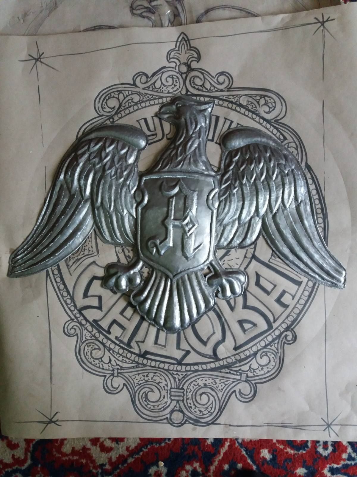 Ковані вироби з металу,  флюгера,  вивіски, фамільні герби, чеканки