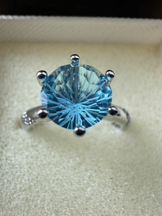 Nowy srebrny pierścionek z topazem
