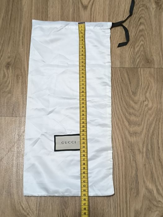 Пильник фірми Gucci