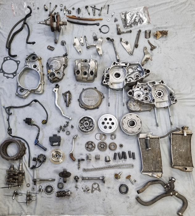 Cześci Honda Crf 450 wałek pokrywa magneto kartery cewka stator wał