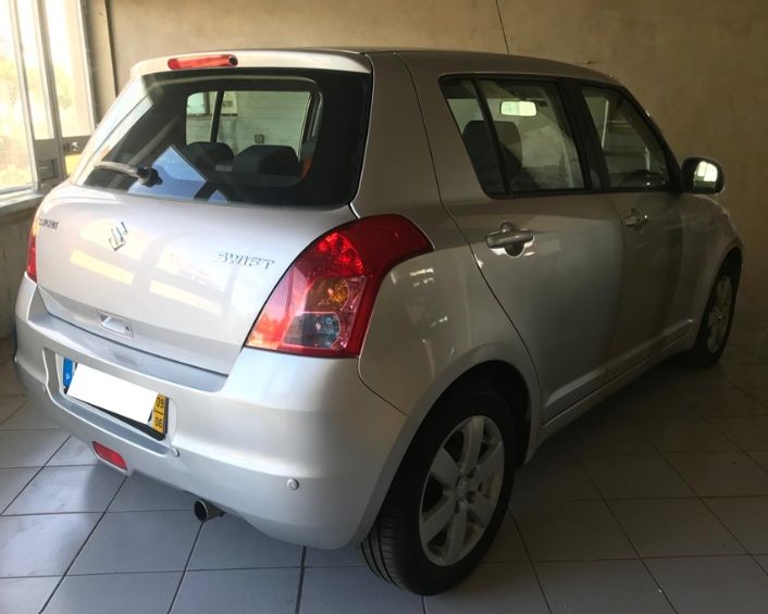 Suzuki Swift 1.3 – 2009 | 75cv | 5 portas | Manual | Cinzento