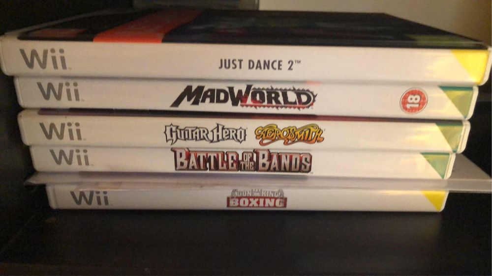Consola branca da wii com jogos e comandos