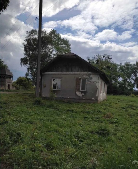 Продається земля і будинок