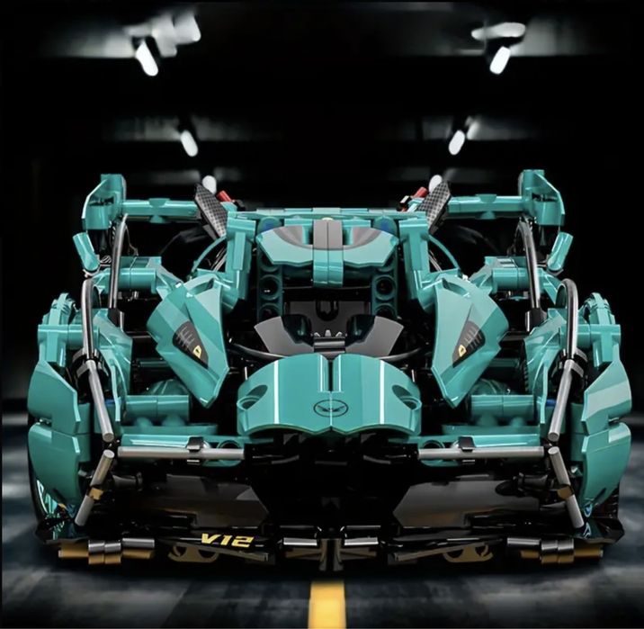 Контсруктор 1300 деталей спортивна машинка 36*17см lego technic бірюза