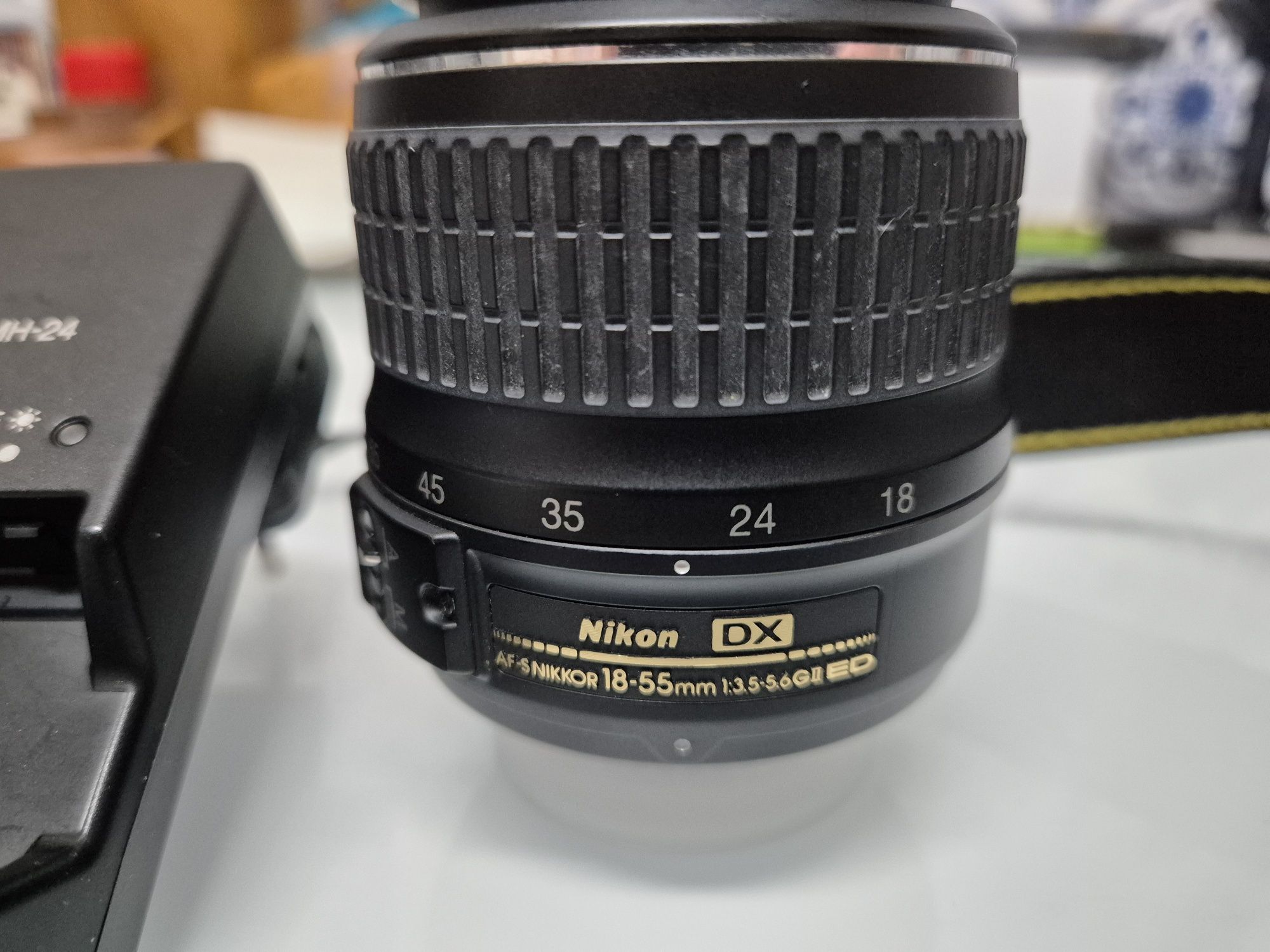 Nikon D3100 + lente