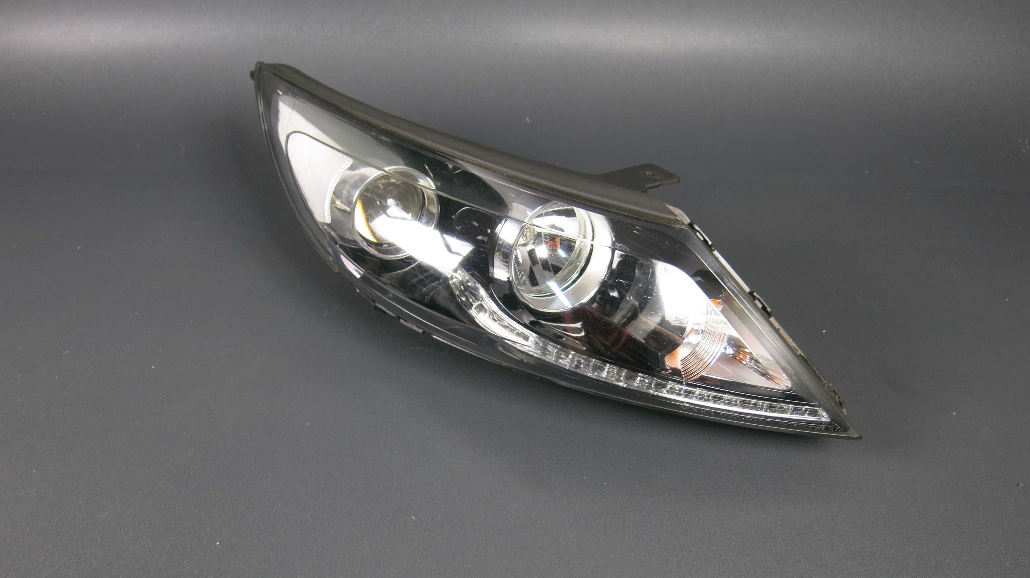 KIA Sportage III 3 lampa przednia przód prawa